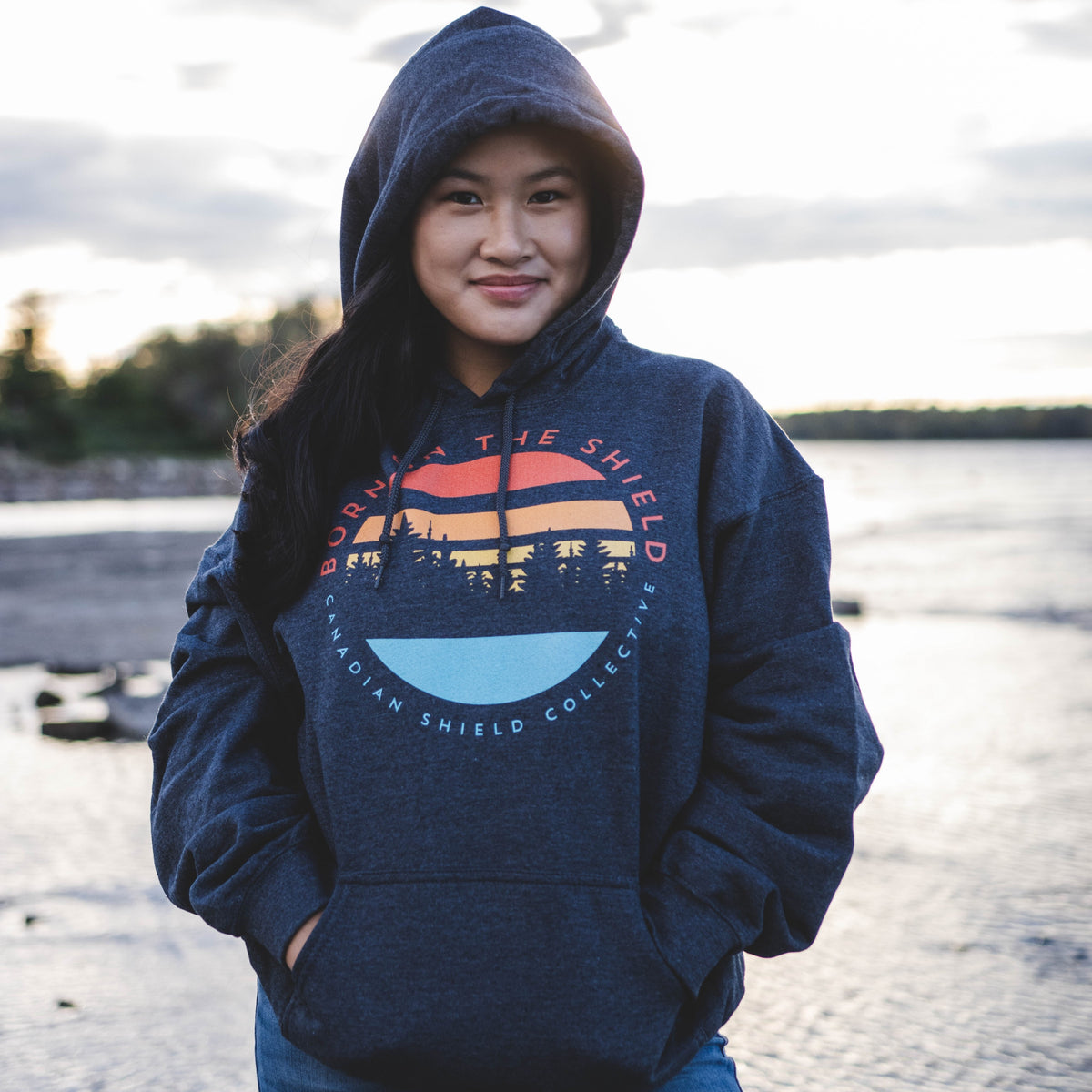 BORN ON THE SHIELD - UNISEX HOODIE - SUNSET LOGO (multiple colours)