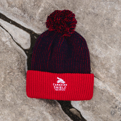 CANADIAN SHIELD COLLECTIVE - POM-POM TOQUE (red & navy, red & blue)