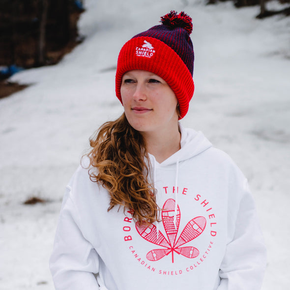 CANADIAN SHIELD COLLECTIVE - POM-POM TOQUE (red & navy, red & blue)